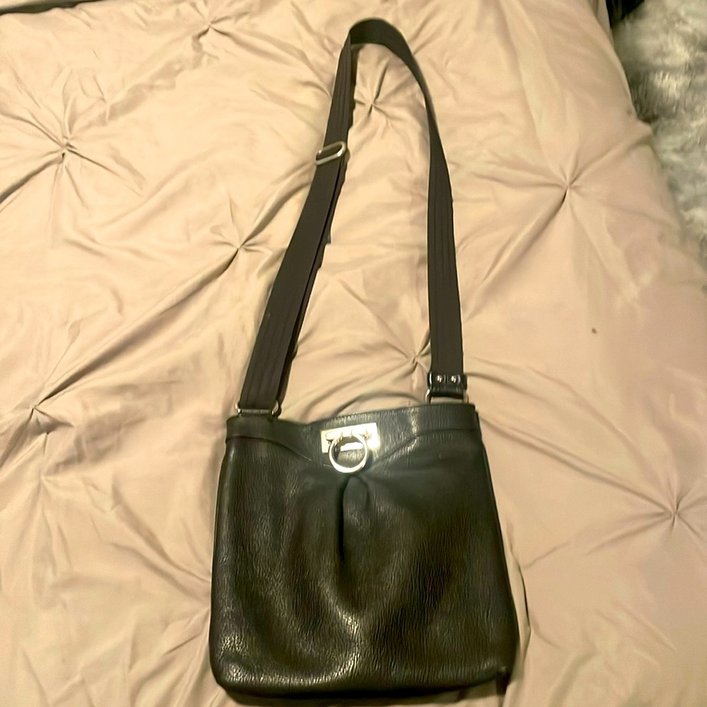 Salvatore ferragamo , cross body, used and in good condition,inside zip pocket